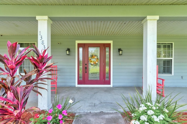 1383 Tumblin Dr, New Smyrna Beach, FL 32168 - view of exterior entry featuring a porch