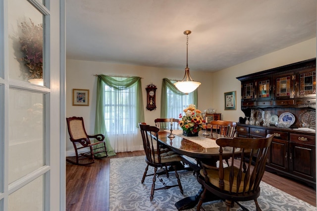 1383 Tumblin Dr, New Smyrna Beach, FL 32168 - dining space with dark wood-style flooring