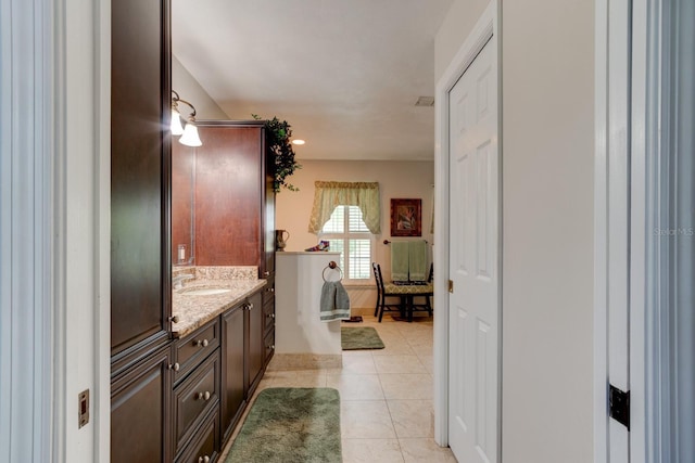1383 Tumblin Dr, New Smyrna Beach, FL 32168 - bathroom with vanity and tile patterned floors