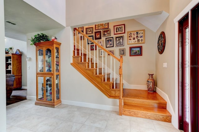 1383 Tumblin Dr, New Smyrna Beach, FL 32168 - staircase with tile patterned flooring