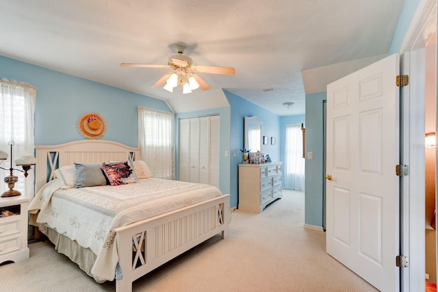 1383 Tumblin Dr, New Smyrna Beach, FL 32168 - bedroom with light carpet, a closet, and a ceiling fan