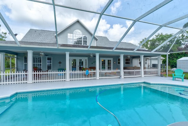1383 Tumblin Dr, New Smyrna Beach, FL 32168 - swimming pool with ceiling fan, french doors, a patio, and a lanai