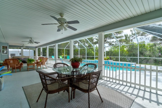 1383 Tumblin Dr, New Smyrna Beach, FL 32168 - sunroom featuring a ceiling fan, outdoor dining space, and healthy amount of natural light