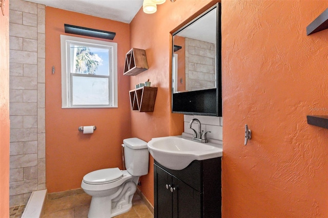 505 Wisteria Rd, Daytona Beach, FL 32118 - bathroom with vanity, tile patterned flooring, and tiled shower