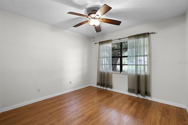 270 Sandyhook Ln, Deland, FL 32724 - spare room featuring wood finished floors, ceiling fan, and a textured ceiling