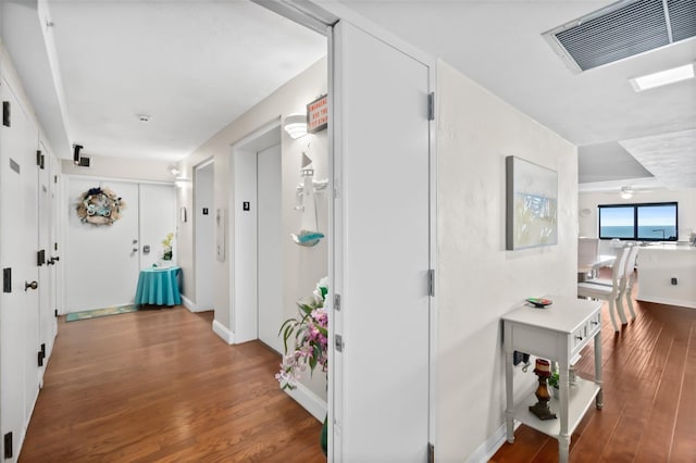 3003 S Atlantic Ave Unit 3A2, Daytona Beach Shores, FL 32118 - corridor with wood finished floors and baseboards