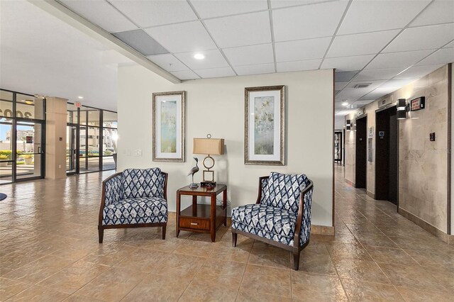 3003 S Atlantic Ave Unit 3A2, Daytona Beach Shores, FL 32118 - community lobby featuring a paneled ceiling