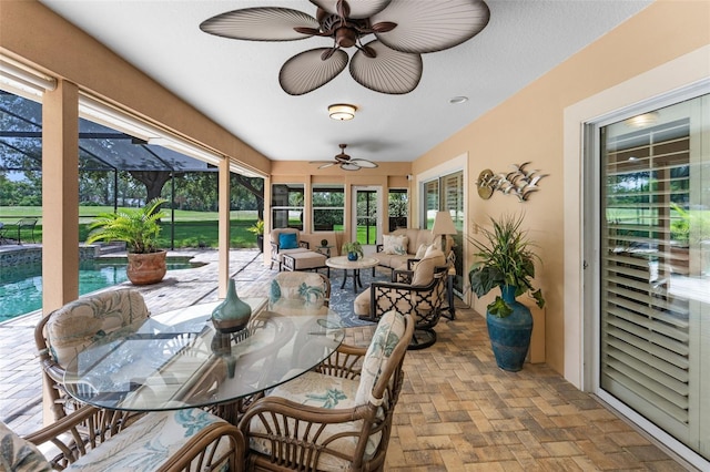3 Pine Meadow Ct, Debary, FL 32713 - sunroom with ceiling fan, outdoor lounge area, and outdoor dining area