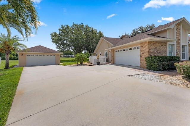 3 Pine Meadow Ct, Debary, FL 32713 - view of front of house featuring brick siding and a front yard