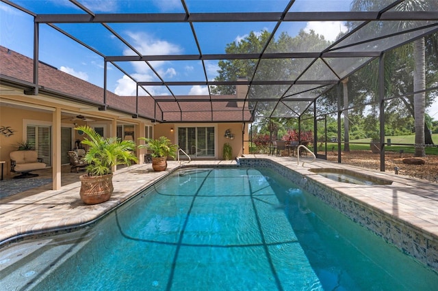 3 Pine Meadow Ct, Debary, FL 32713 - swimming pool featuring an in-ground hot tub, a patio, a ceiling fan, and a lanai