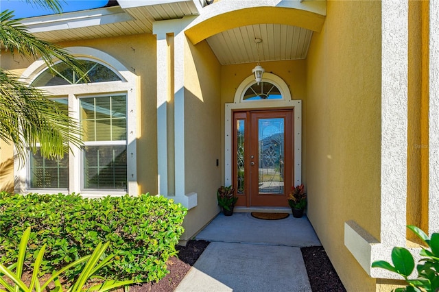727 Grape Ivy Ln, New Smyrna Beach, FL 32168 - property entrance with stucco siding