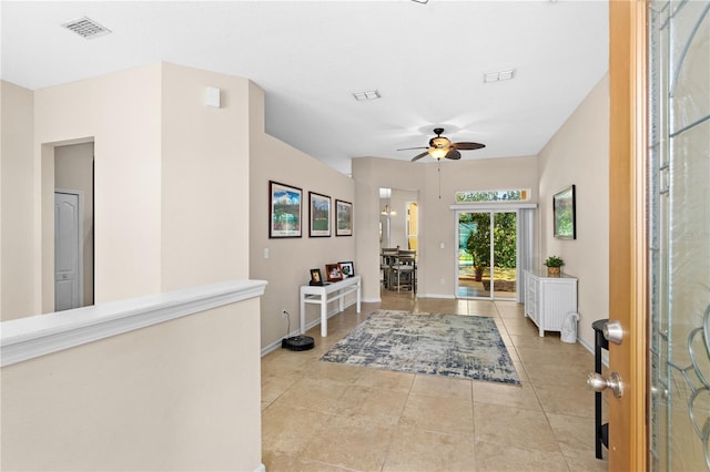 727 Grape Ivy Ln, New Smyrna Beach, FL 32168 - entrance foyer with a ceiling fan and light tile patterned flooring
