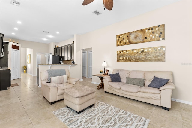 727 Grape Ivy Ln, New Smyrna Beach, FL 32168 - living area with a ceiling fan, light tile patterned flooring, and recessed lighting