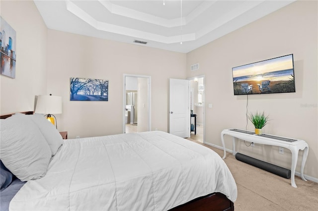 727 Grape Ivy Ln, New Smyrna Beach, FL 32168 - bedroom with light carpet and a raised ceiling