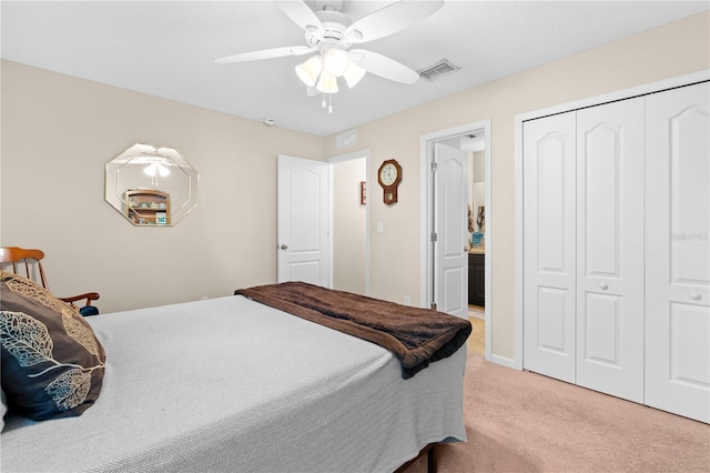 727 Grape Ivy Ln, New Smyrna Beach, FL 32168 - bedroom featuring light carpet, a closet, and a ceiling fan
