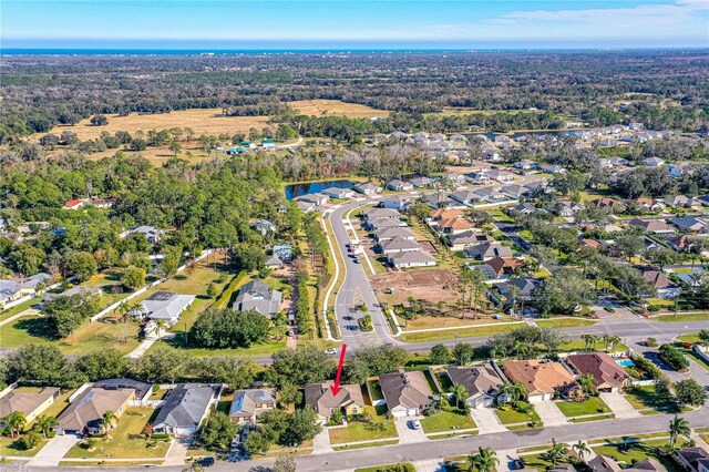 727 Grape Ivy Ln, New Smyrna Beach, FL 32168 - aerial overview of property's location with nearby suburban area