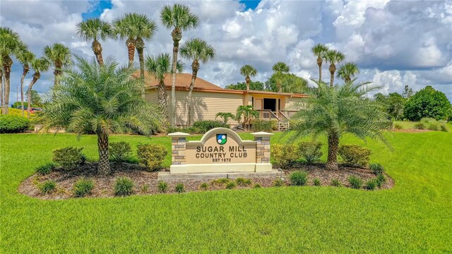 727 Grape Ivy Ln, New Smyrna Beach, FL 32168 - community sign featuring a yard