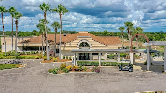 727 Grape Ivy Ln, New Smyrna Beach, FL 32168 - view of building exterior with uncovered parking