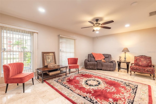2724 N Halifax Ave, Daytona Beach, FL 32118 - living room featuring a ceiling fan and recessed lighting
