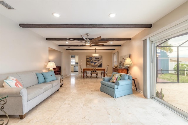 2724 N Halifax Ave, Daytona Beach, FL 32118 - living area featuring healthy amount of natural light, beam ceiling, a ceiling fan, and recessed lighting