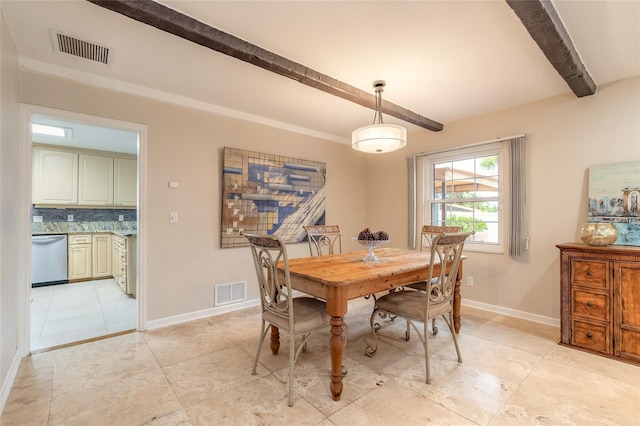 2724 N Halifax Ave, Daytona Beach, FL 32118 - dining area with beam ceiling and light tile patterned floors
