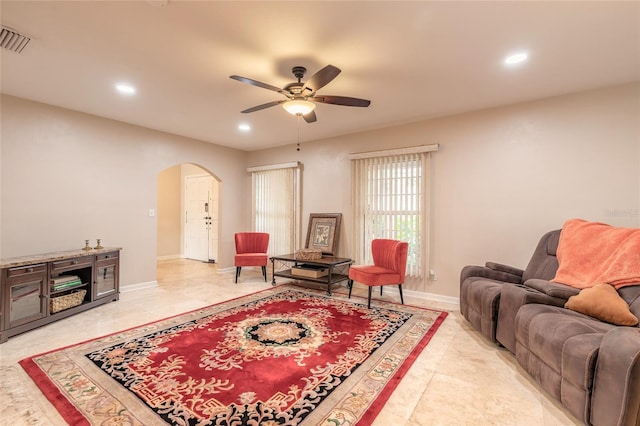 2724 N Halifax Ave, Daytona Beach, FL 32118 - living area with arched walkways, ceiling fan, and recessed lighting