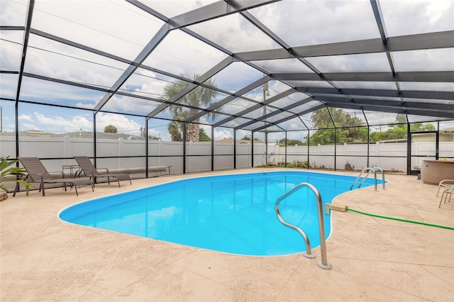 2724 N Halifax Ave, Daytona Beach, FL 32118 - view of swimming pool featuring a patio, a fenced backyard, and a lanai