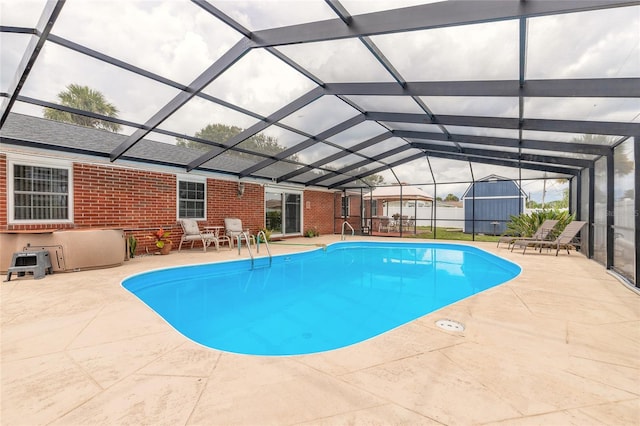 2724 N Halifax Ave, Daytona Beach, FL 32118 - outdoor pool with a patio, a lanai, and a storage shed