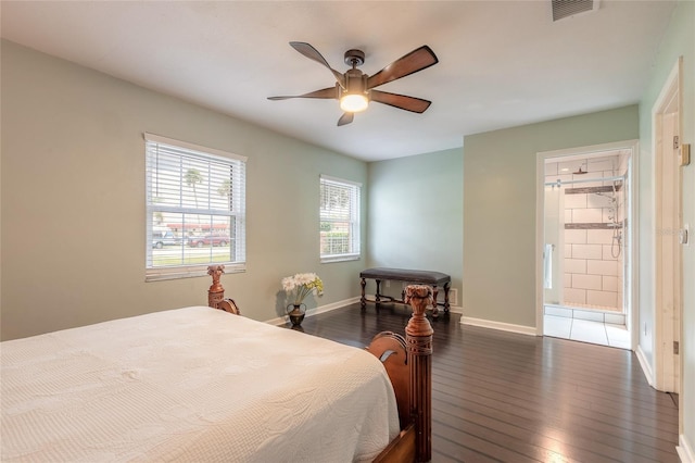 2724 N Halifax Ave, Daytona Beach, FL 32118 - bedroom featuring dark wood-style floors, ceiling fan, and ensuite bath