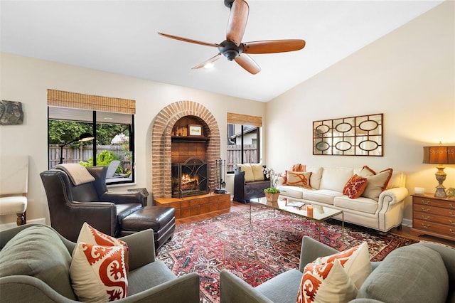 1261 Burning Tree Ln, Winter Park, FL 32792 - living area with a ceiling fan, a brick fireplace, wood finished floors, and vaulted ceiling