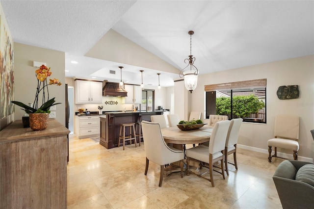 1261 Burning Tree Ln, Winter Park, FL 32792 - dining space with lofted ceiling and recessed lighting