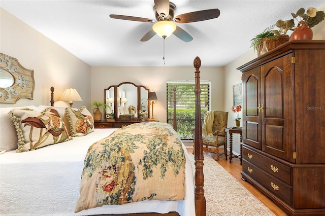 1261 Burning Tree Ln, Winter Park, FL 32792 - bedroom with light wood-style floors and a ceiling fan
