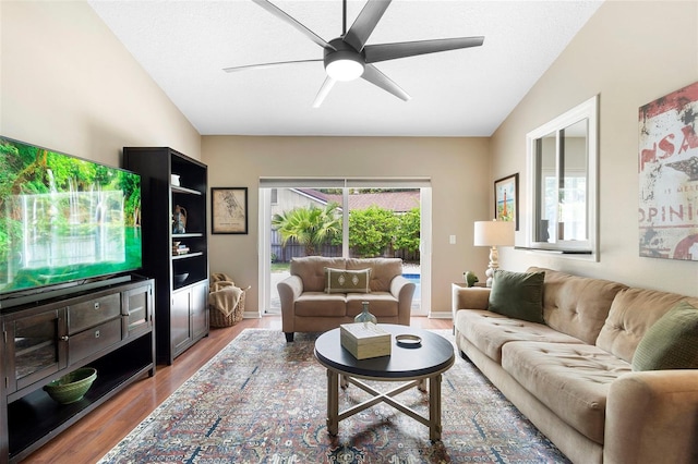 1261 Burning Tree Ln, Winter Park, FL 32792 - living area featuring light wood-type flooring, lofted ceiling, and ceiling fan