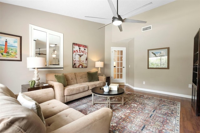 1261 Burning Tree Ln, Winter Park, FL 32792 - living area with dark wood-style flooring, a ceiling fan, and a towering ceiling