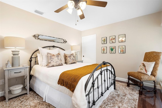 1261 Burning Tree Ln, Winter Park, FL 32792 - bedroom featuring wood finished floors and ceiling fan