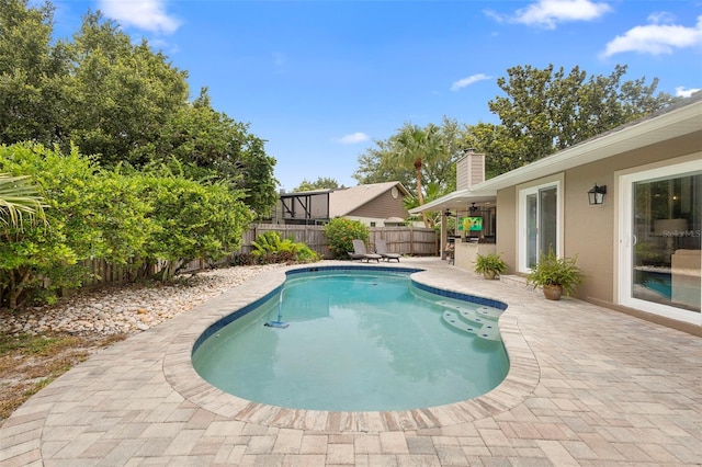 1261 Burning Tree Ln, Winter Park, FL 32792 - view of swimming pool featuring a patio area and a fenced backyard
