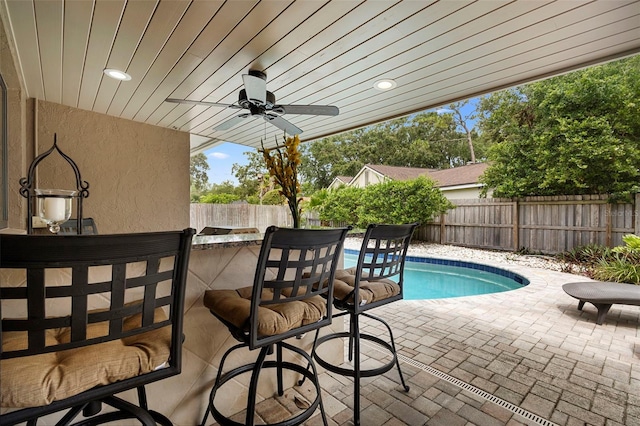 1261 Burning Tree Ln, Winter Park, FL 32792 - view of swimming pool with a patio area, a fenced backyard, and a ceiling fan