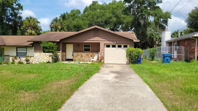 1513 S Elsasser St, Deland, FL 32720 - single story home with stone siding, driveway, and a garage