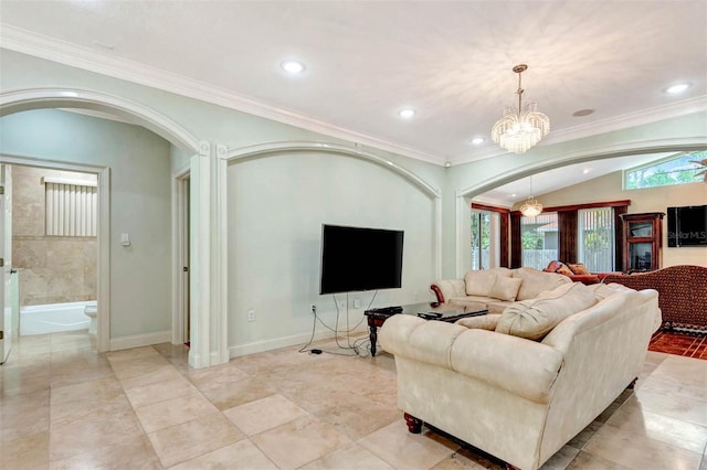 3428 Longleaf Rd, Ormond Beach, FL 32174 - living room with arched walkways, a chandelier, ornamental molding, and recessed lighting