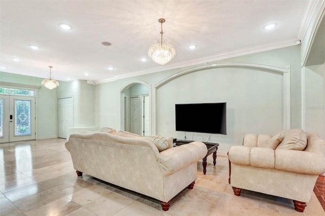 3428 Longleaf Rd, Ormond Beach, FL 32174 - living room with a chandelier, ornamental molding, arched walkways, light tile patterned floors, and recessed lighting