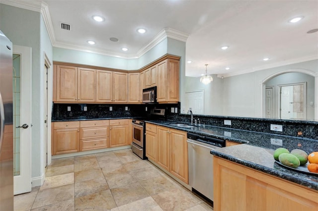 3428 Longleaf Rd, Ormond Beach, FL 32174 - kitchen with stainless steel appliances, backsplash, ornamental molding, light brown cabinetry, and recessed lighting