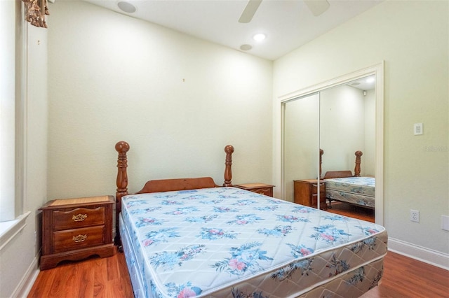 3428 Longleaf Rd, Ormond Beach, FL 32174 - bedroom with wood finished floors, a ceiling fan, and a closet
