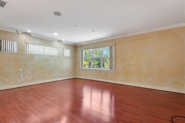 3428 Longleaf Rd, Ormond Beach, FL 32174 - unfurnished room with wood finished floors, ornamental molding, and recessed lighting
