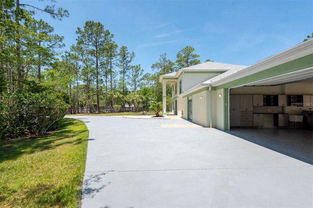 3428 Longleaf Rd, Ormond Beach, FL 32174 - view of property exterior featuring stucco siding
