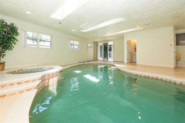 3428 Longleaf Rd, Ormond Beach, FL 32174 - view of pool featuring a skylight and a pool with connected hot tub