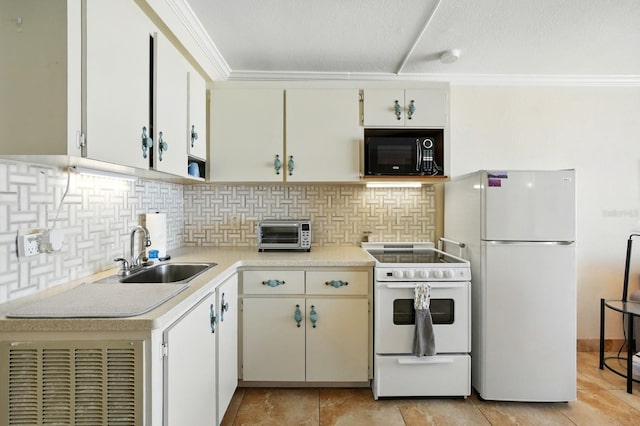 2043 S Atlantic Ave Unit 520, Daytona Beach, FL 32118 - kitchen featuring white appliances, light countertops, decorative backsplash, crown molding, and white cabinetry