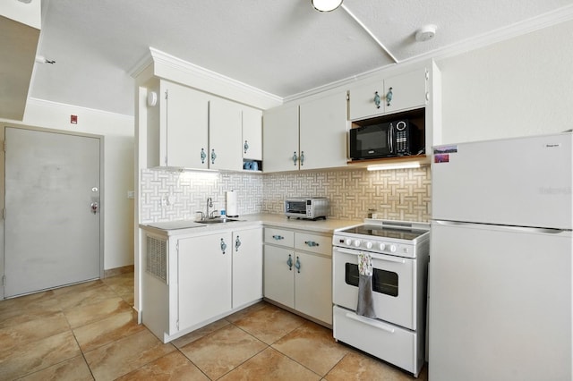 2043 S Atlantic Ave Unit 520, Daytona Beach, FL 32118 - kitchen with white appliances, light countertops, tasteful backsplash, crown molding, and white cabinetry
