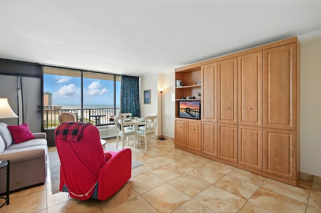 2043 S Atlantic Ave Unit 520, Daytona Beach, FL 32118 - living area with floor to ceiling windows and baseboards