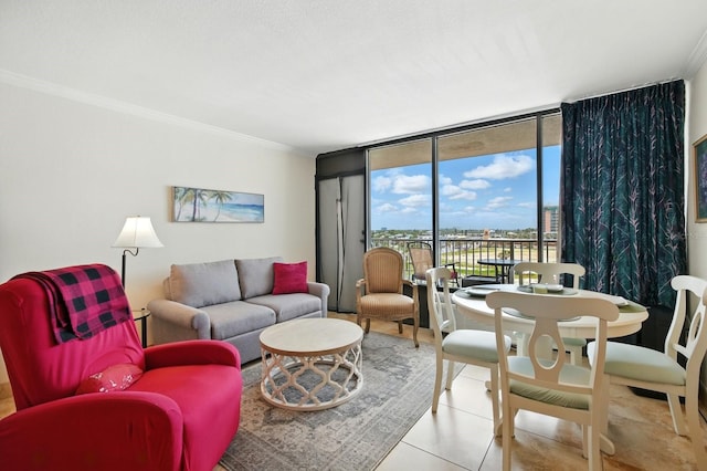 2043 S Atlantic Ave Unit 520, Daytona Beach, FL 32118 - living room with floor to ceiling windows, crown molding, and tile patterned flooring