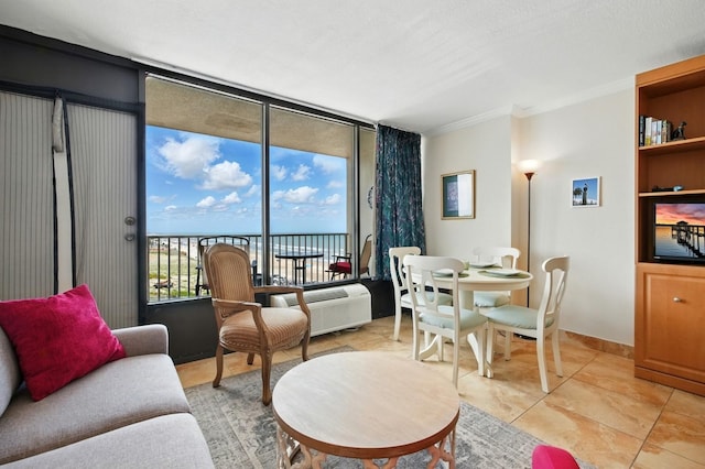2043 S Atlantic Ave Unit 520, Daytona Beach, FL 32118 - living area featuring crown molding, a water view, floor to ceiling windows, and light tile patterned flooring